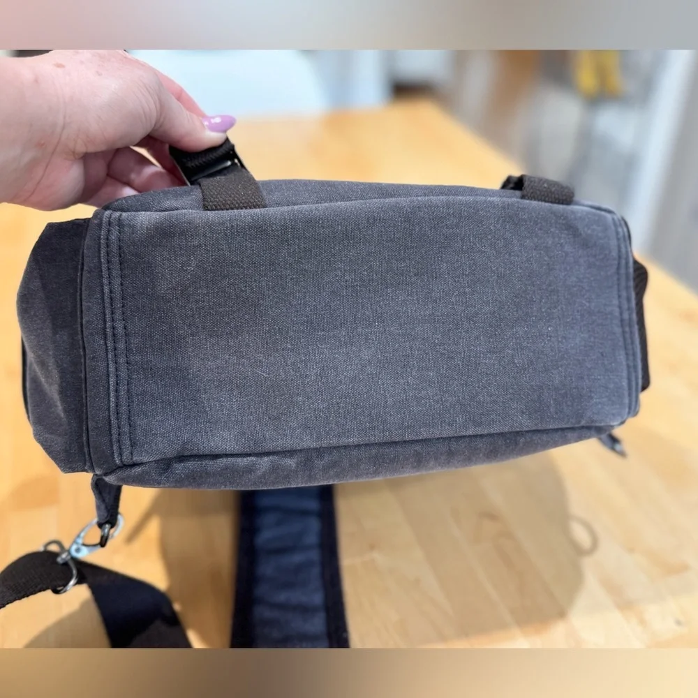 Gray Canvas Crossbody Backpack with Brown Accents Multiple Compartments Durable